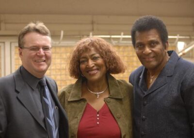 Brian Edwards, company President, greets Charley Pride and his wife Rozene upon their arrival back in Canada for another series of concert dates.
