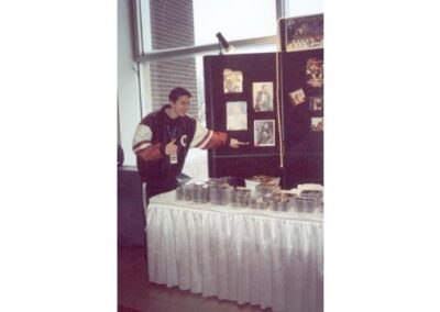 Lawrence Welk Show Accordion player Tim Padilla FINALLY spots his picture on the Rocklands display board. It may only be one inch high, but he's pleased to show his mom that his picture WAS there!!!